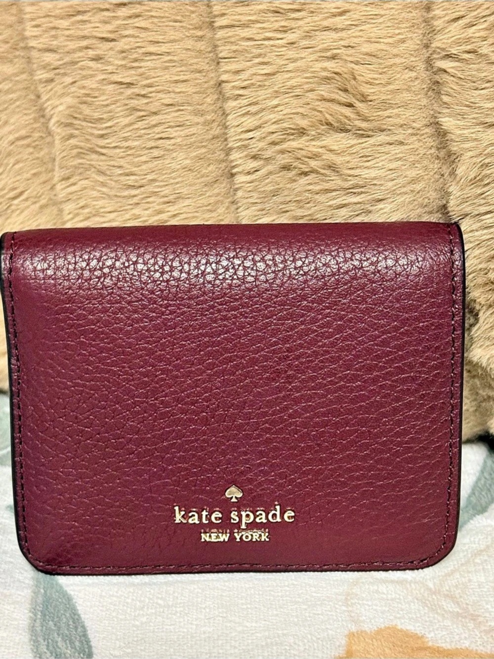 Kate Spade New York Deep Cherry Maple Pebbled Leather Small Flap Bifold Wallet